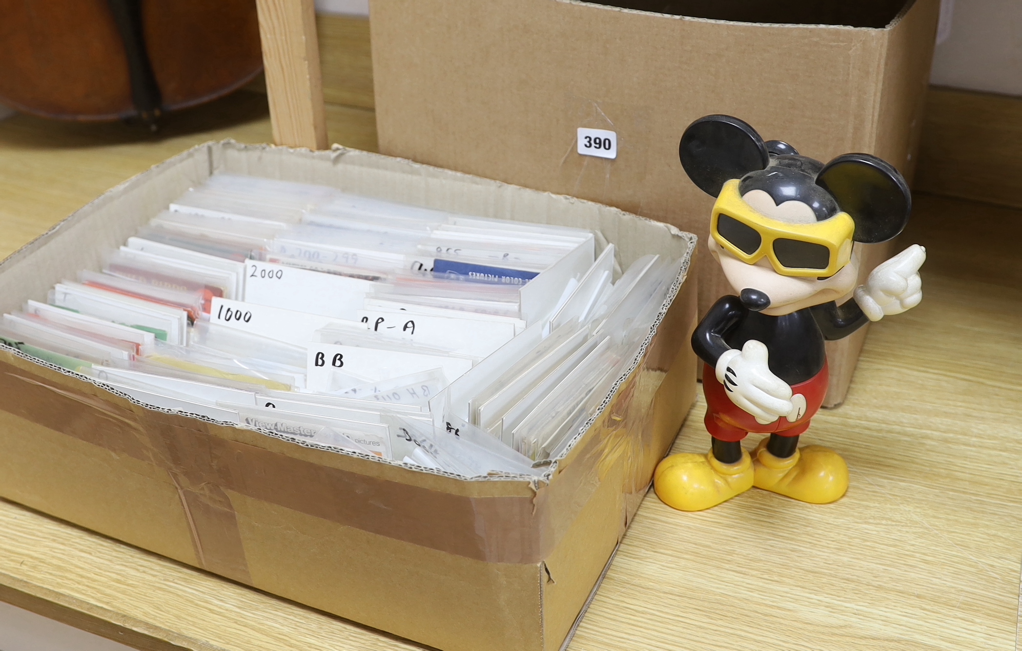 Fifteen View-Master viewers, including a large Mickey Mouse example, two ‘Model K’ viewers, one in red and another orange, together with a large quantity of reels with subjects including Natural History, National Parks,